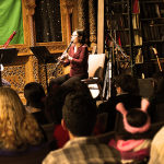 Image: Three women musician performing in front of a crowd in an intimate performance venue just before the New York City shuttered due to the pandemic.