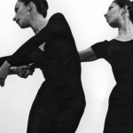 Image: Detail of a black and white photograph by Robert Rauschenberg featuring five dancers from Merce Cunningham's company in various stages of movement wearing all black.