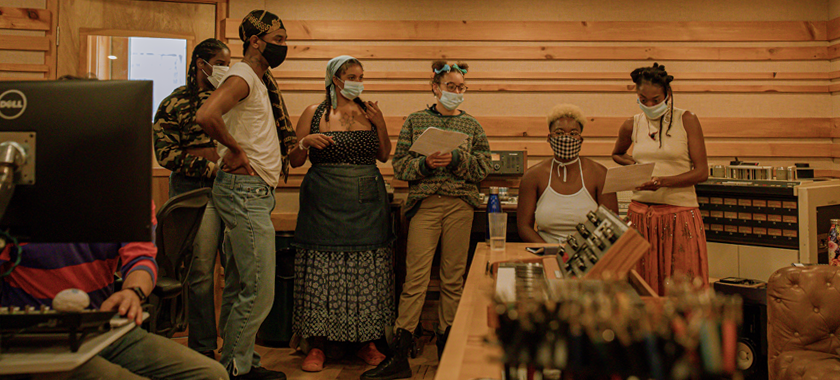 Image Detail: A group of Black and Brown artists gather in the recording studio at Activation Residency's "Respite as Resistance."