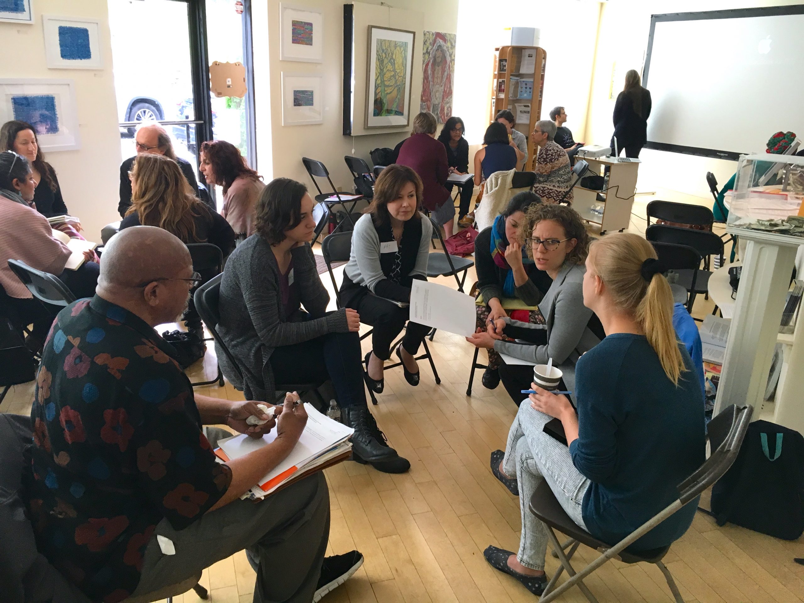 Artists in a group discussing professional practices at the NYSCA/NYFA Artist as Entrepreneur Program at Huntington Arts Council.