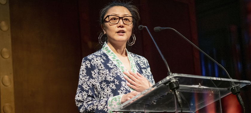 Artist Fay Ku addressing the crowd at NYFA's 2022 Hall of Fame Benefit