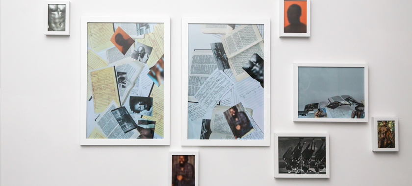 Installation shot of images by Jonathan Gardenhire on a white gallery wall