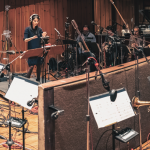 Tracy Yang conducts her 17-piece Jazz Orchestra at recording studio in New York