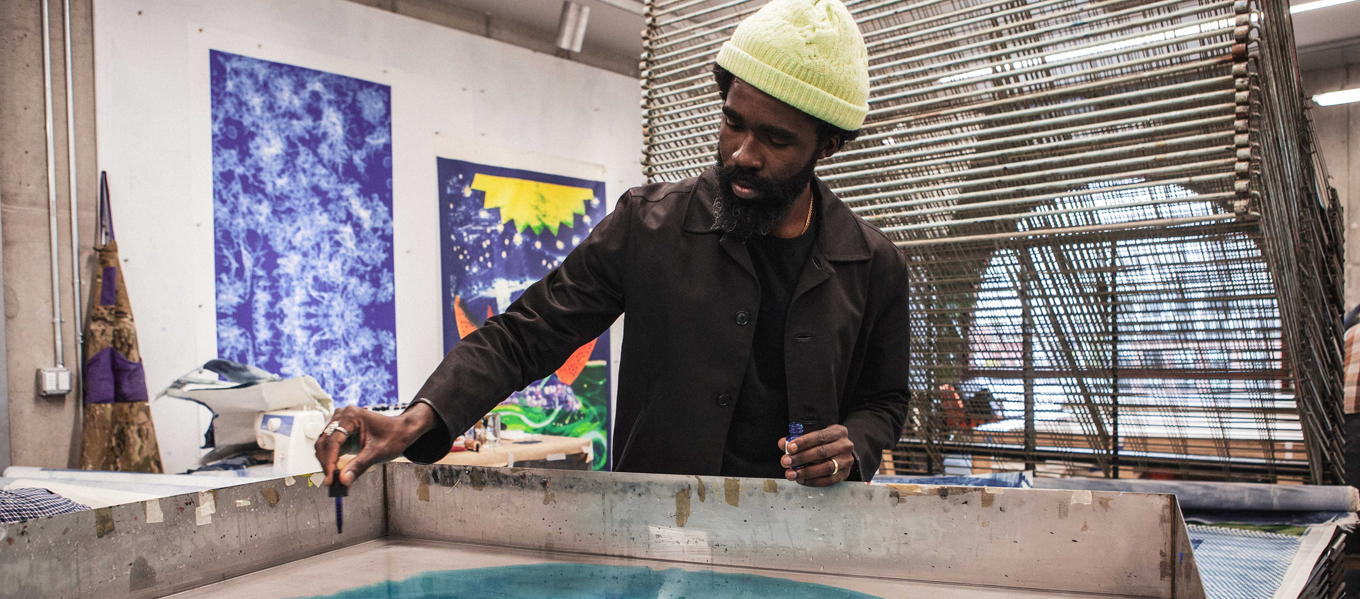 Former Powerhouse Arts Artist in Residence Ivan Ford working in the Print Shop