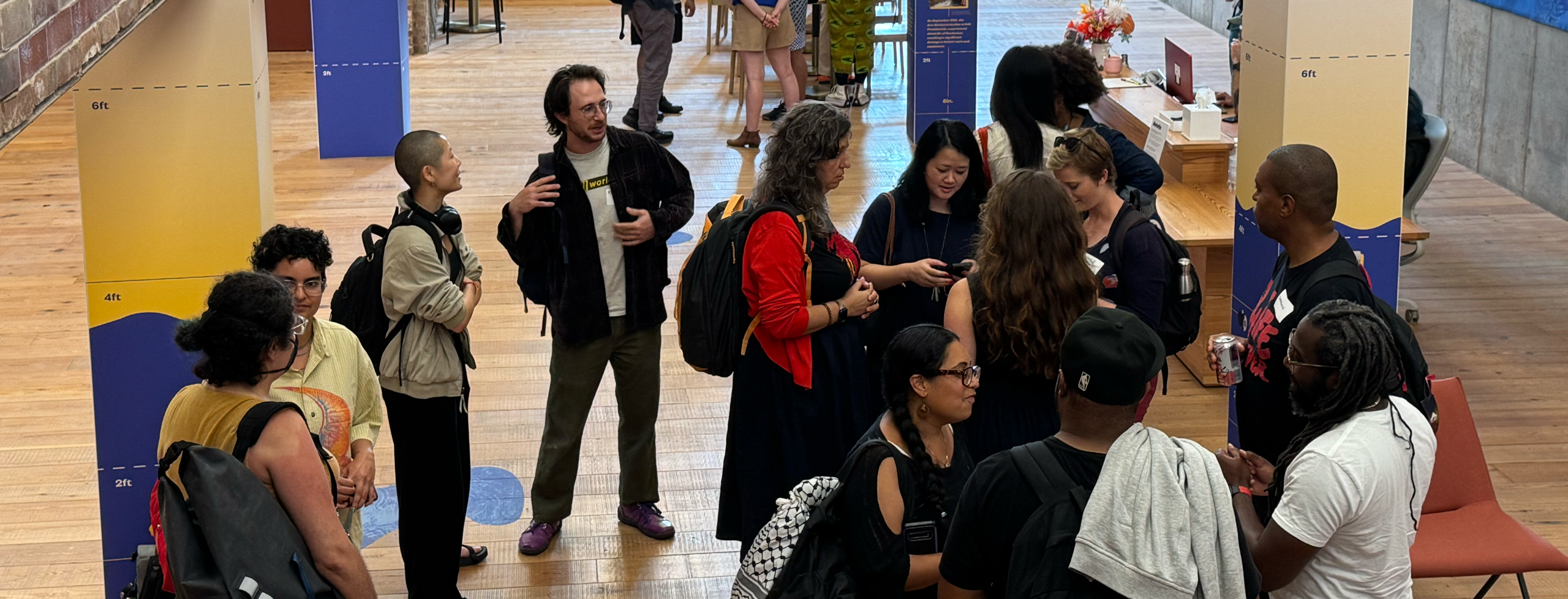 Participants in the Artist as Entrepreneur conversing in small groups