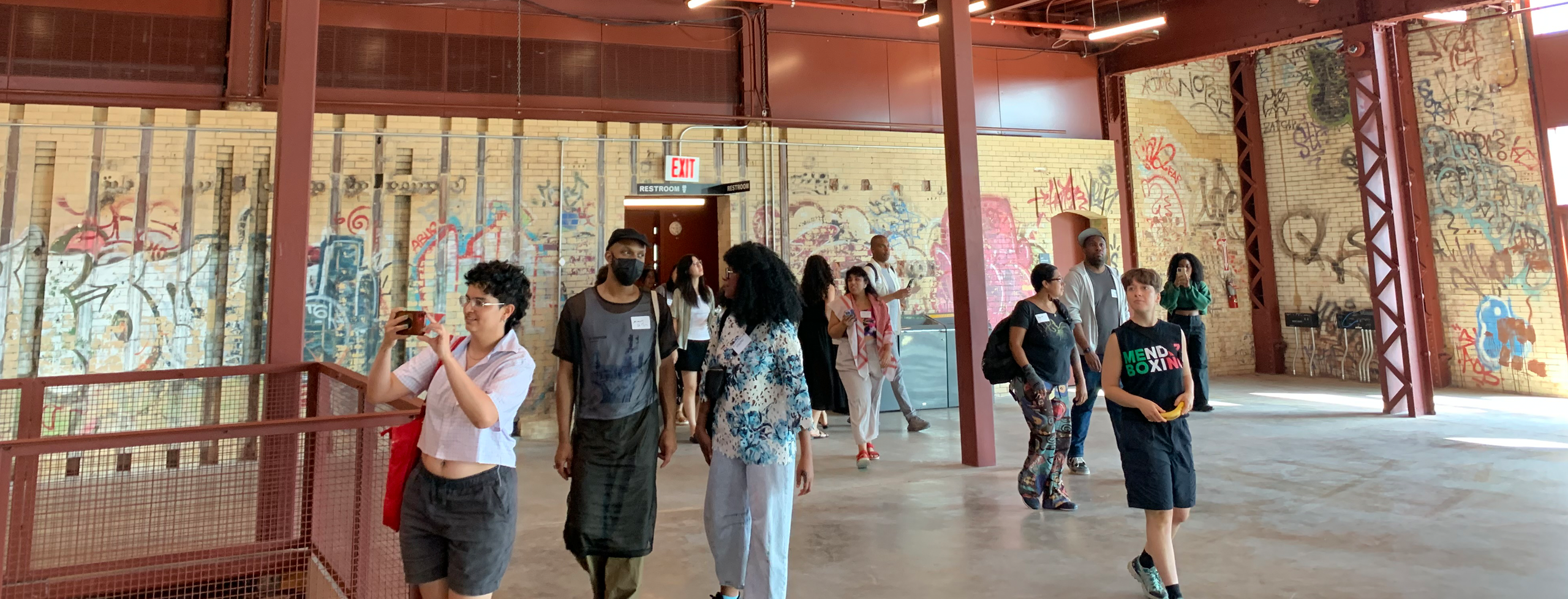Participants in the Artist as Entrepreneur Programs in Powerhouse Arts' light and graffiti-filled Grand Hall