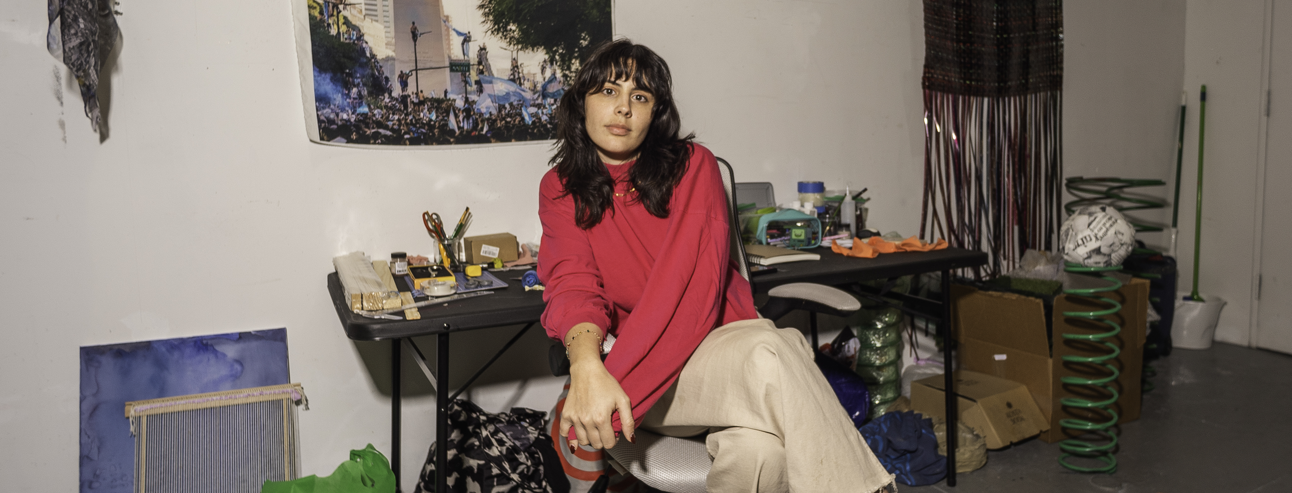 Agustina Markez seated and pictured in a studio setting