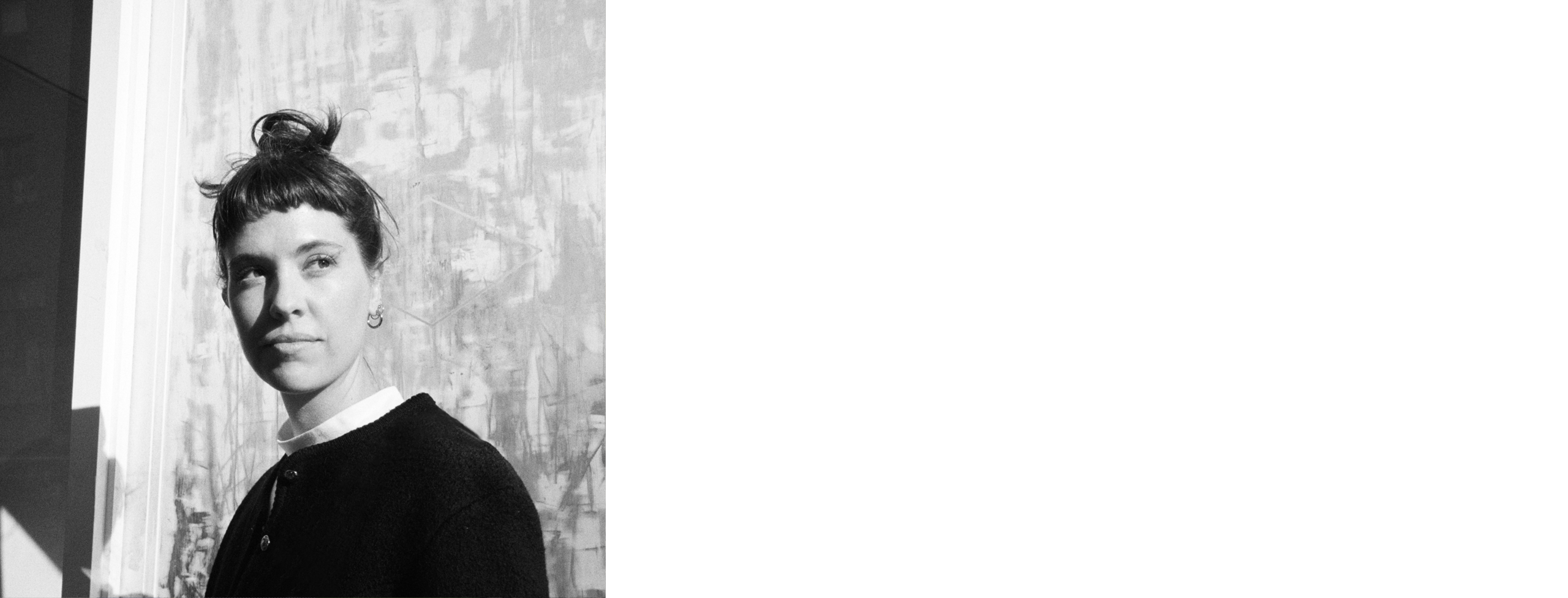 Black and white headshot of Elisa Lutteral