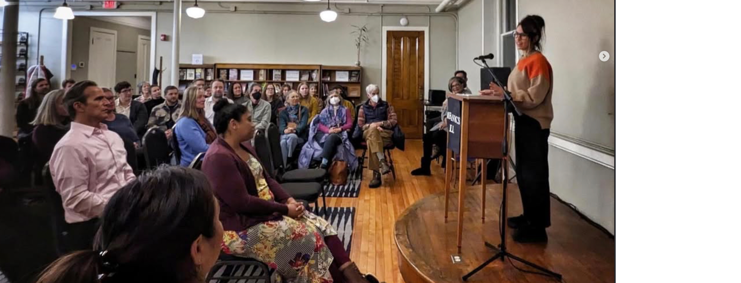 Leila Nadir giving a reading